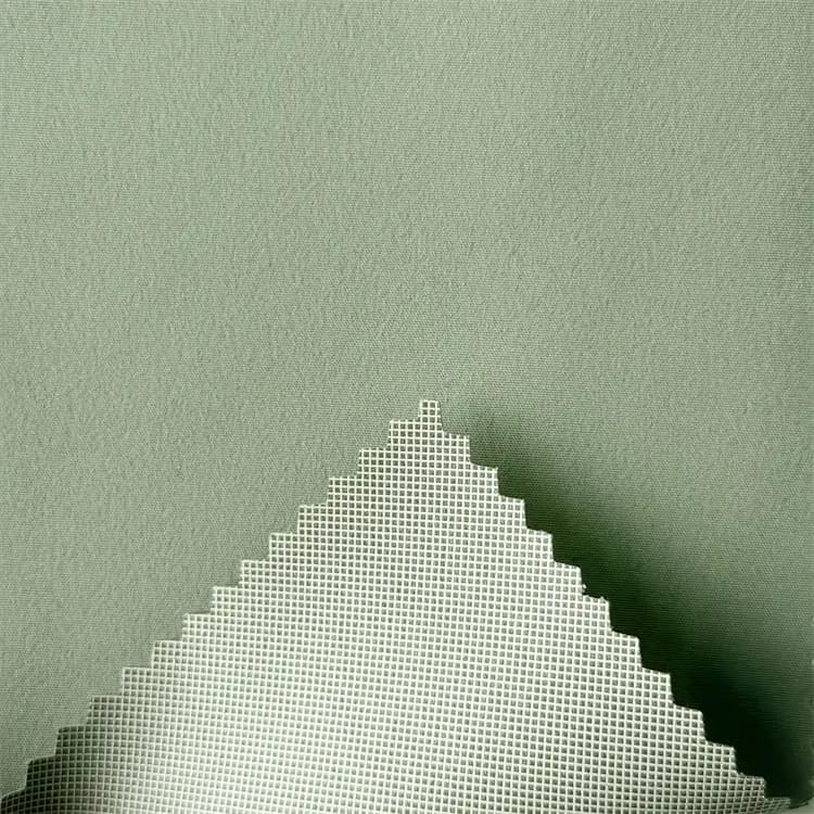 SJ-38242 laminated fabric showing its white-grid TPU backing