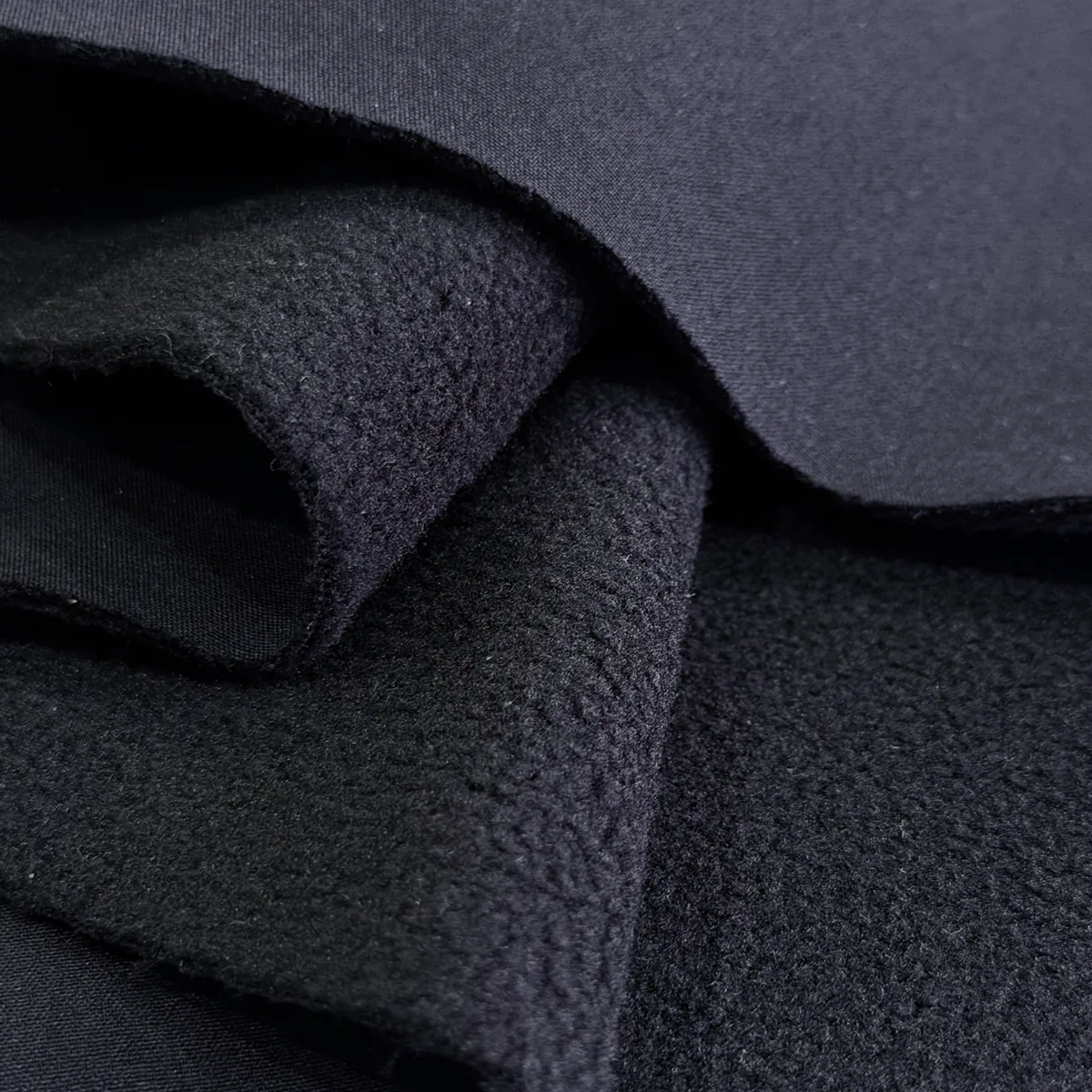 YA-KN 01 black matte face and soft fleece reverse close-up