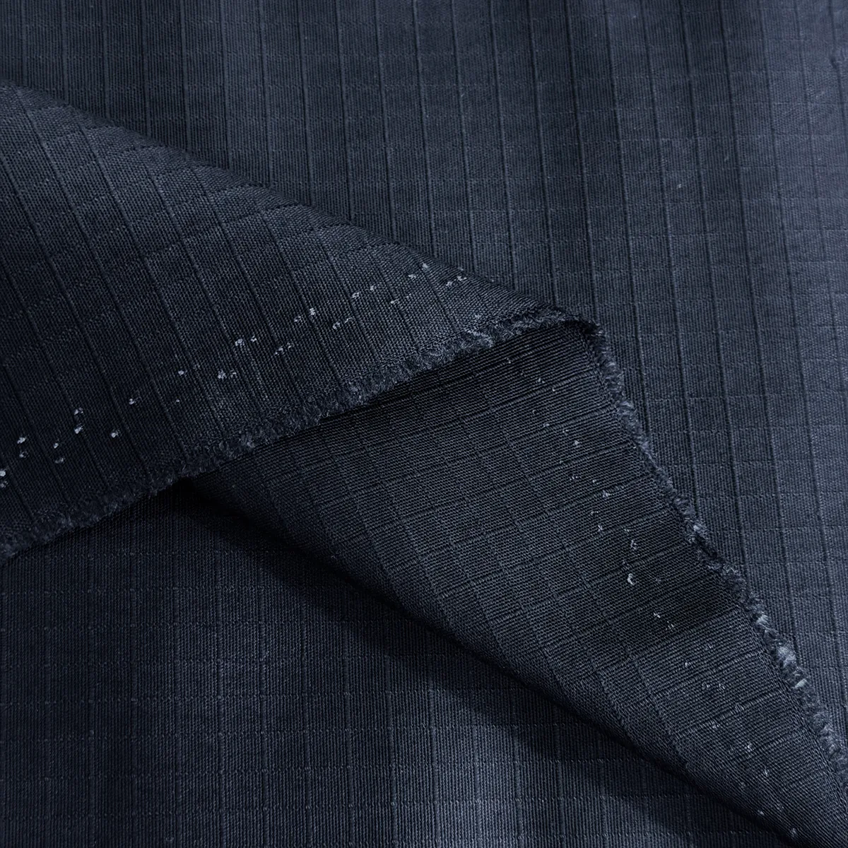 YA-KN02 deep-navy textured face and reverse detail
