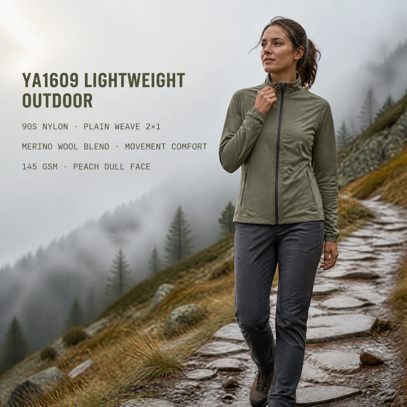 Illustrative YA1609 olive lightweight outdoor jacket application on a mountain trail
